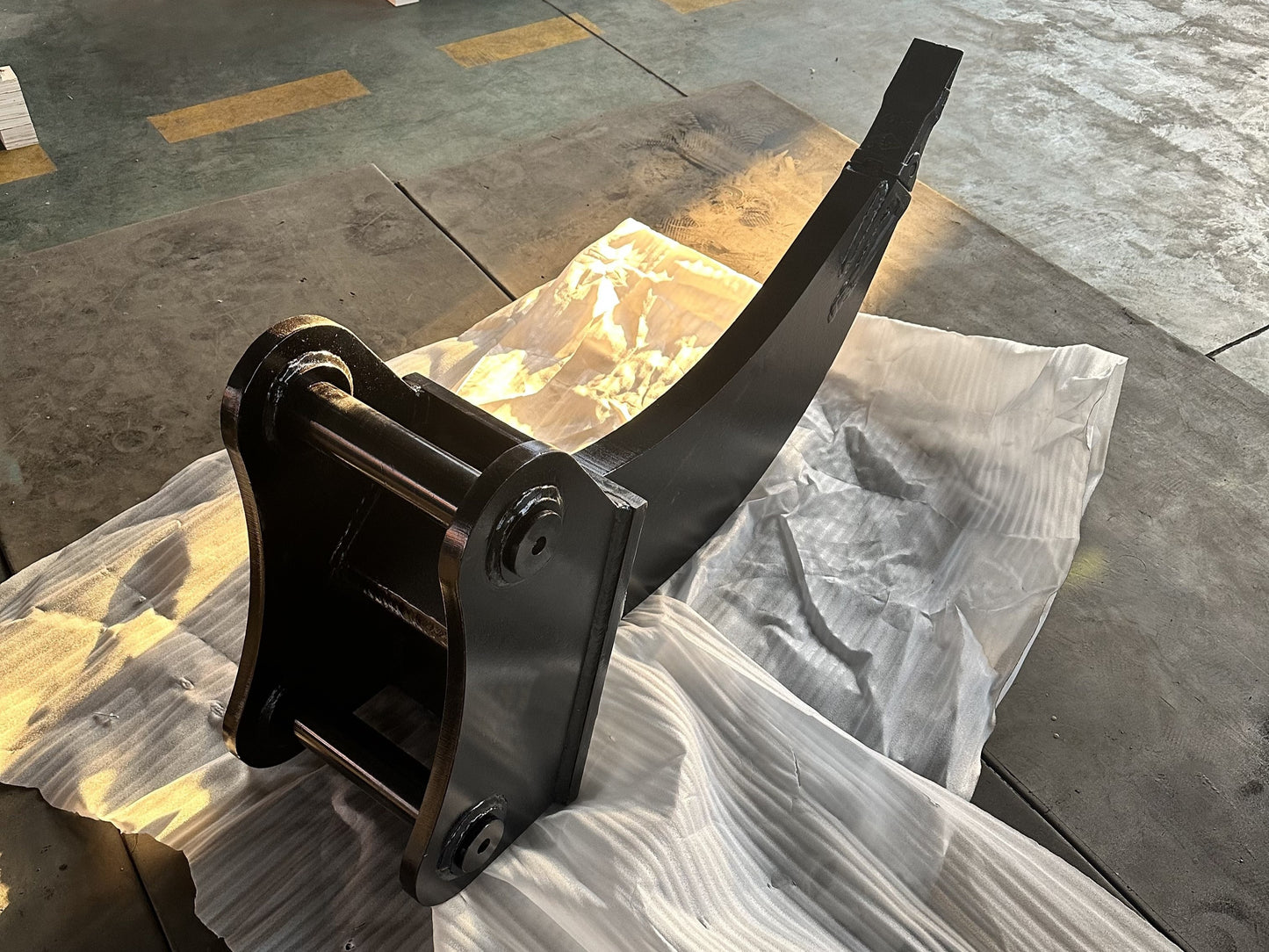 Mini excavator ripper attachment designed for digging roots and breaking compact soil ideal for landscaping and small construction work in Canada