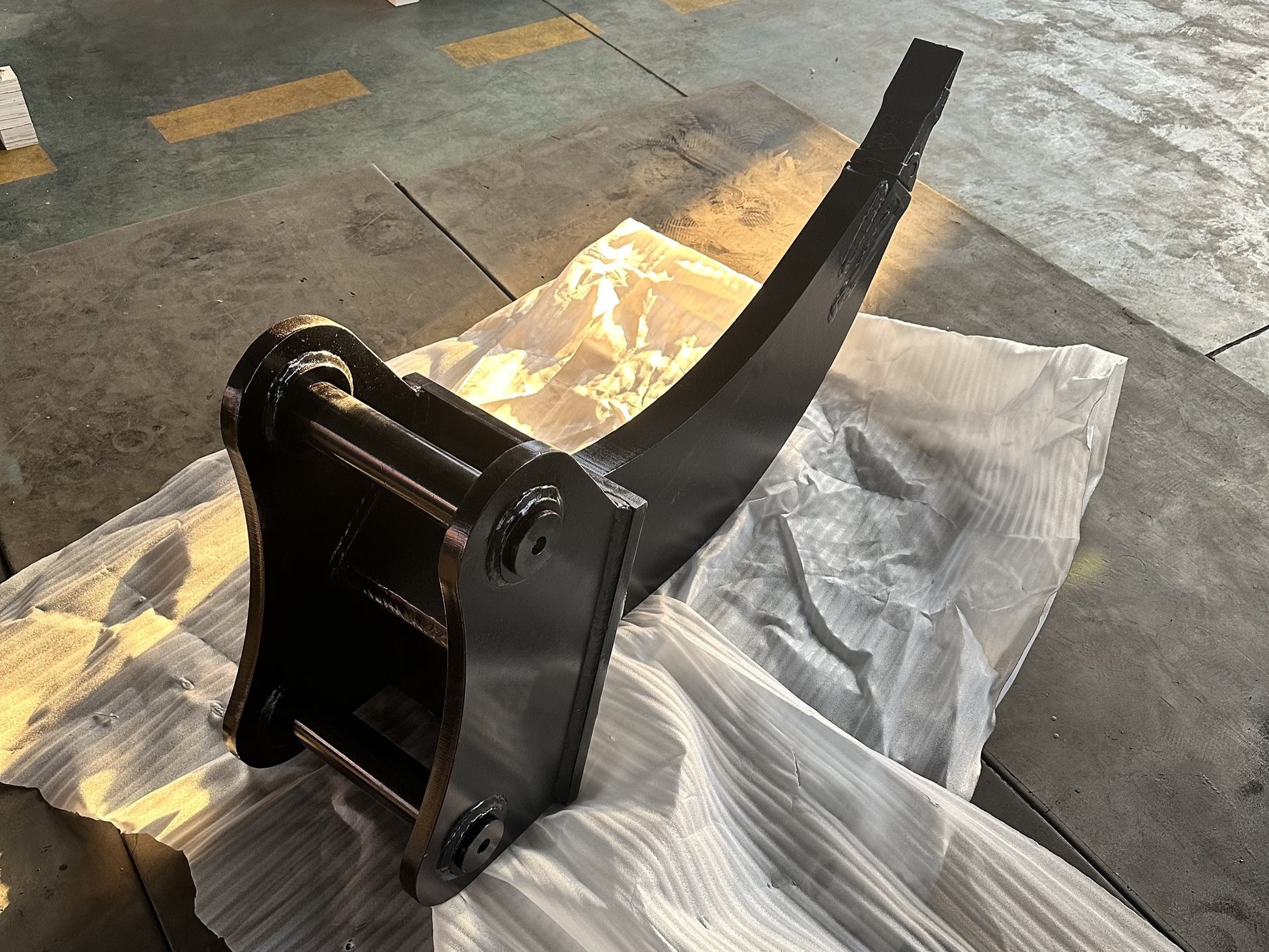 Mini excavator ripper attachment designed for digging roots and breaking compact soil ideal for landscaping and small construction work in Canada