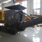 mini mobile crusher in Canada showing compact tracked demolition crusher for construction site recycling and onsite crushing of concrete and waste

