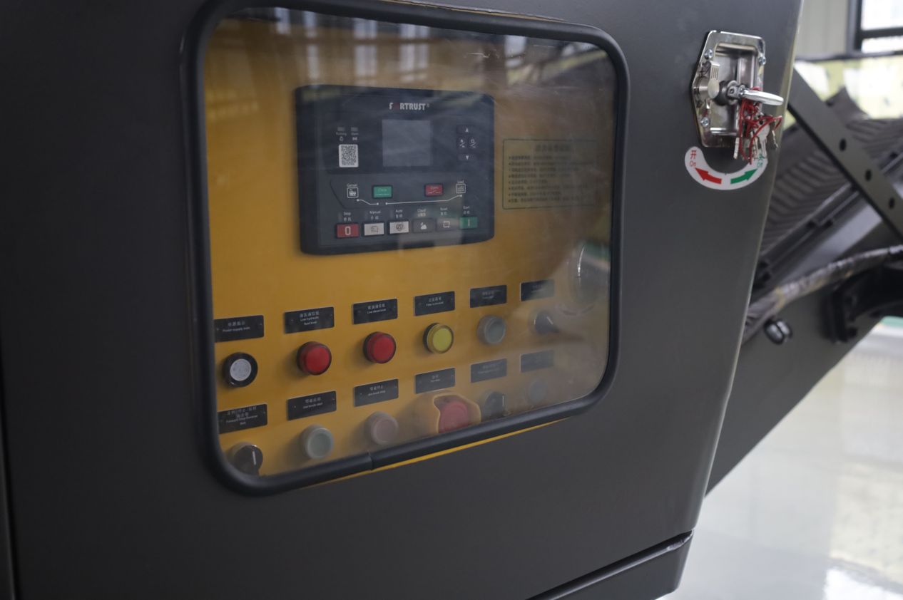 control panel of mini mobile crusher in Canada showing compact tracked crusher operation system for demolition recycling and construction crushing

