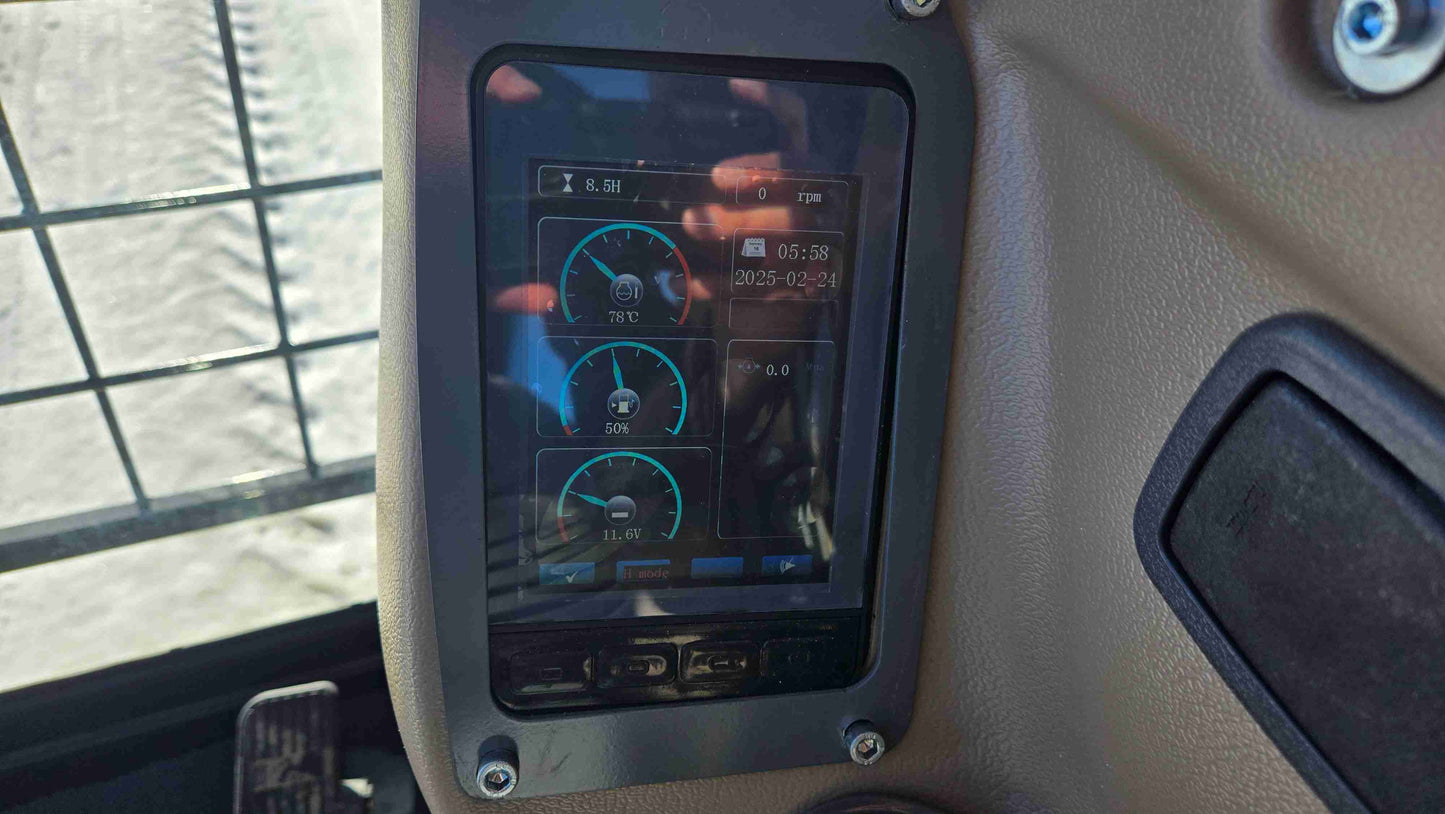 Digital display monitor inside Rippa NDI680 skid steer showing engine temperature fuel level and system status for construction landscaping and farming use in Canada by JoyT5
