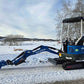 Rippa R10 1 ton mini excavator with long arm digging on a snowy rural road in Canada from JoyT5 dealer compact excavator for tight spaces landscaping and residential projects