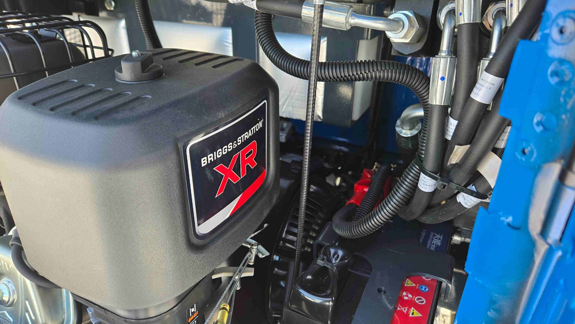 JoyT5 Rippa R10 mini excavator engine compartment showing Briggs and Stratton XR power unit in Canada for reliable small construction equipment
