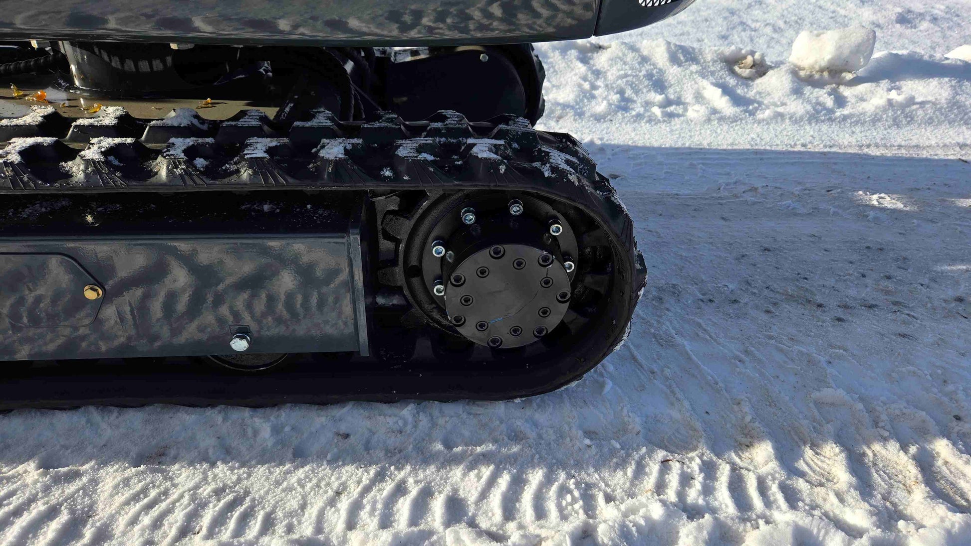 Rippa R10 1 Ton Mini Excavator for Sale in Canada JoyT5 track system close up showing strong traction for compact excavator working in snow and small construction sites