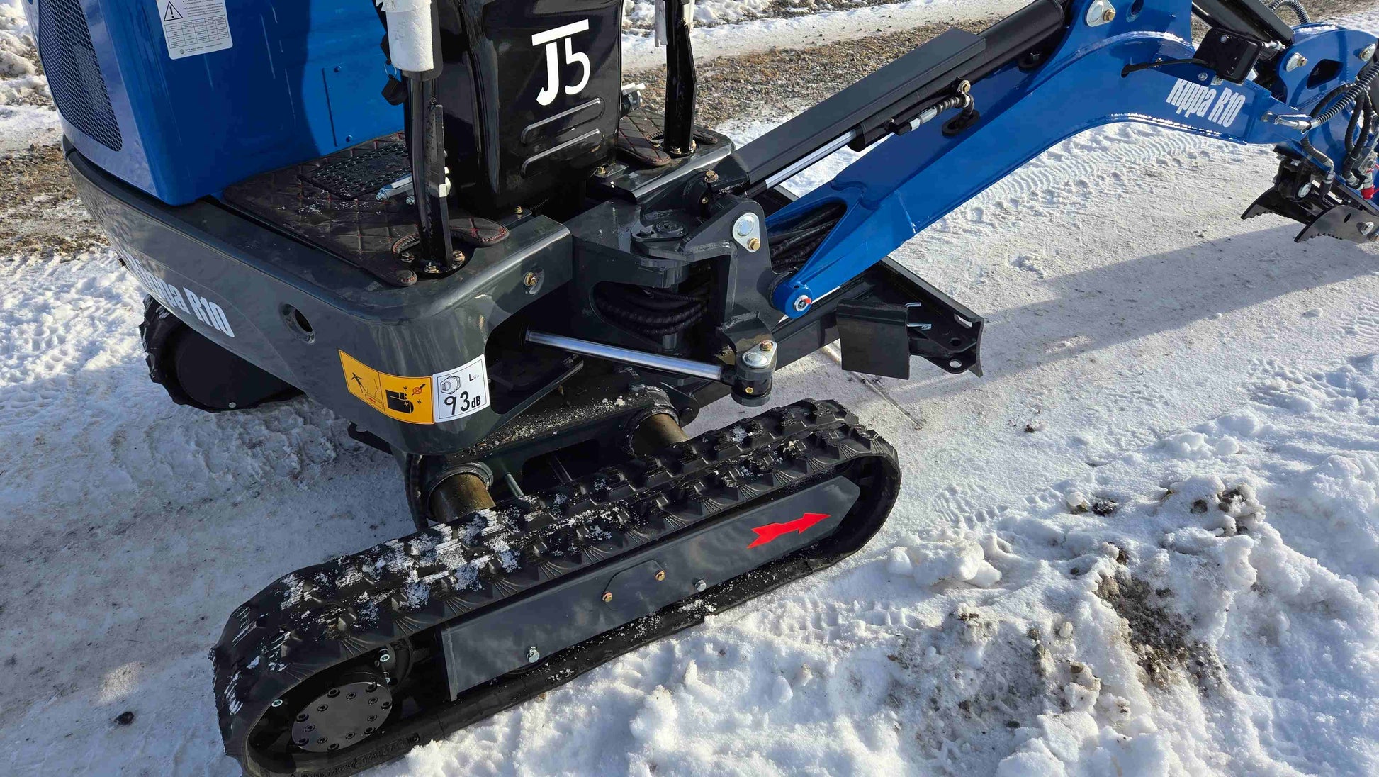 Rippa R10 1 Ton Mini Excavator for Sale in Canada showing the strong track and undercarriage on snow with JoyT5 dealer support for small excavator projects in Canada