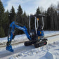 Rippa R10 mini excavator parked on snowy road in Canada, compact digger by JoyT5 designed for tight space construction and small digging projects.