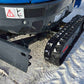 Close-up of Rippa R10 mini excavator front blade and rubber track on snowy ground in Canada, compact construction digger by JoyT5 for small projects.