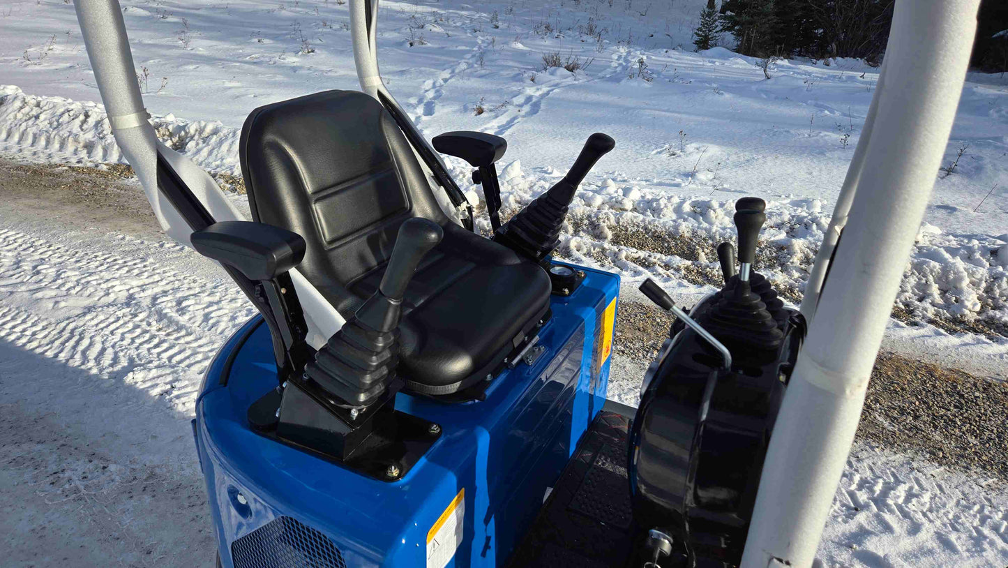 Rippa R10 mini excavator operator seat and control joysticks in Canada by JoyT5, comfortable compact design for precise construction operation.