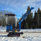 Side view of Rippa R10 mini excavator with boom arm lifted on snowy ground in Canada, compact and powerful construction digger by JoyT5 for tight space projects.