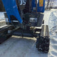 Close-up view of Rippa R10 mini excavator undercarriage and rubber tracks working on snowy ground in Canada, compact construction equipment by JoyT5.
