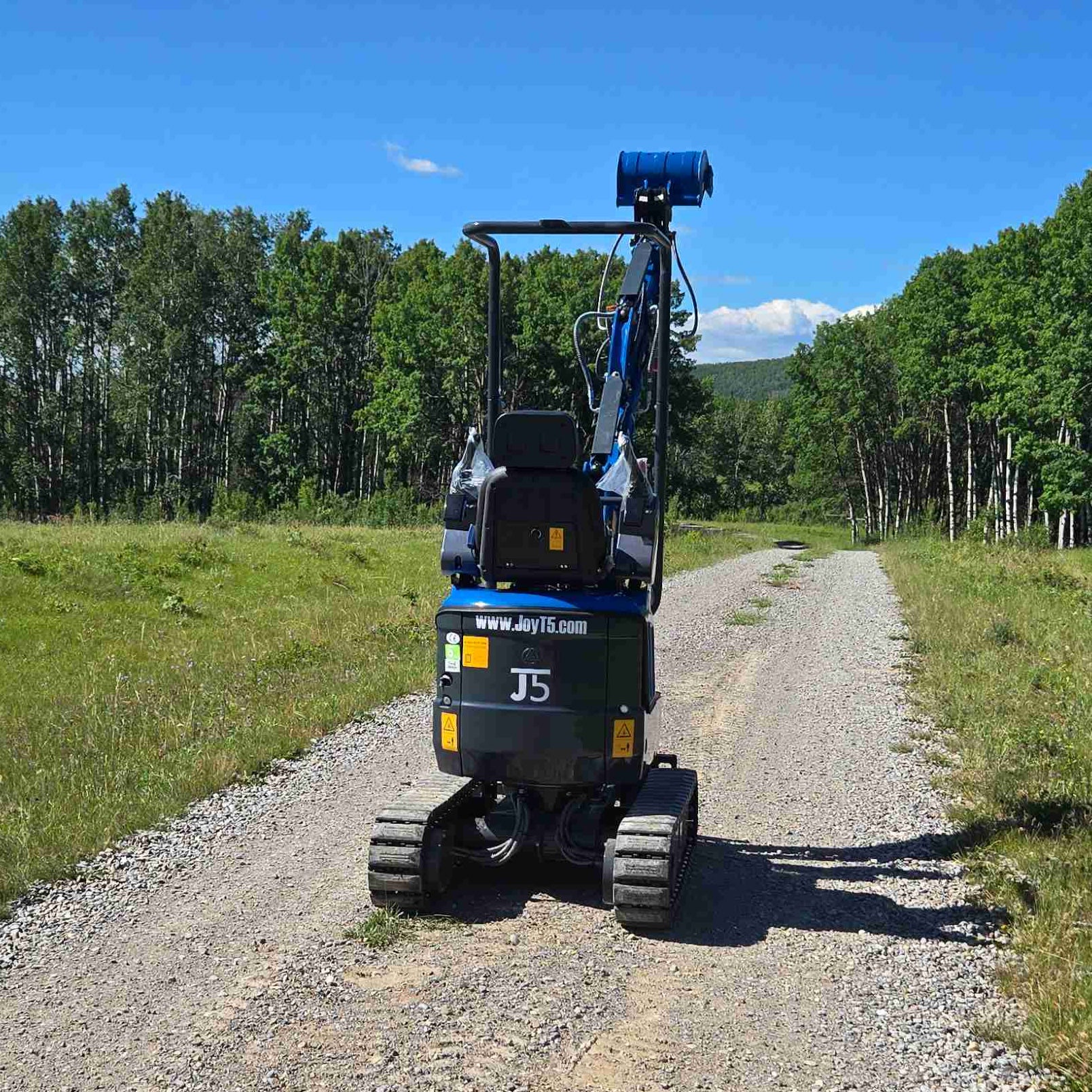 Rippa R13 1.3 ton mini excavator for sale in Canada | Compact mini excavator rear side view for construction and landscaping supported by JoyT5