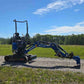 Full side view of Rippa R13 1.3 ton mini excavator with fully extended digging arm on gravel path | Compact mini excavator for construction, landscaping, and property work in Canada with JoyT5 support