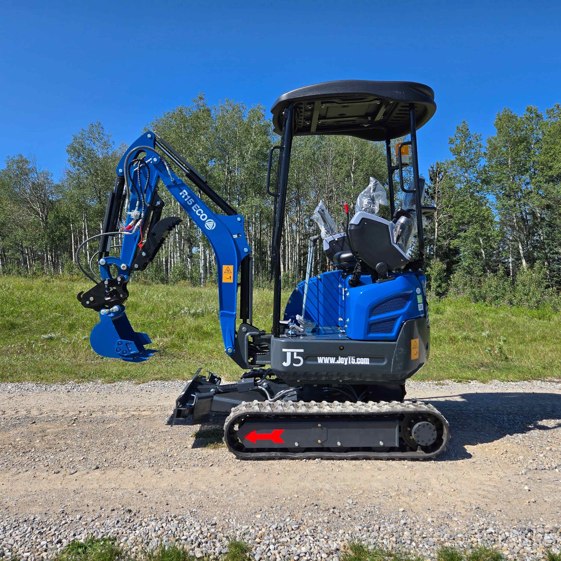 JoyT5 Rippa R15 1.5 ton mini excavator in Canada on a gravel site used as a compact excavator for landscaping and small construction projects