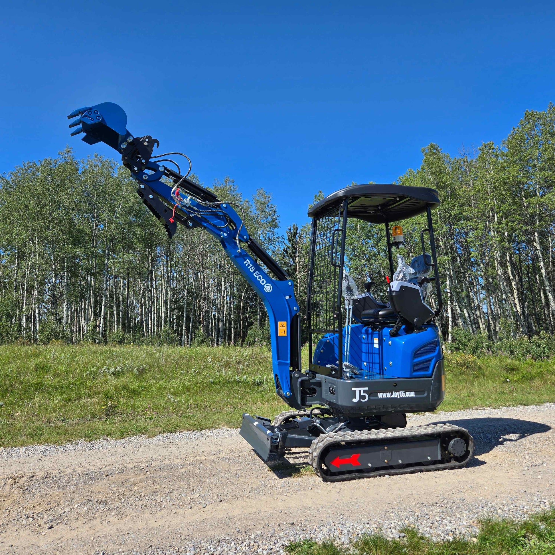 Rippa R15 1.5 ton mini excavator for sale in Canada by JoyT5 shown working as a compact digging machine for landscaping and small construction projects