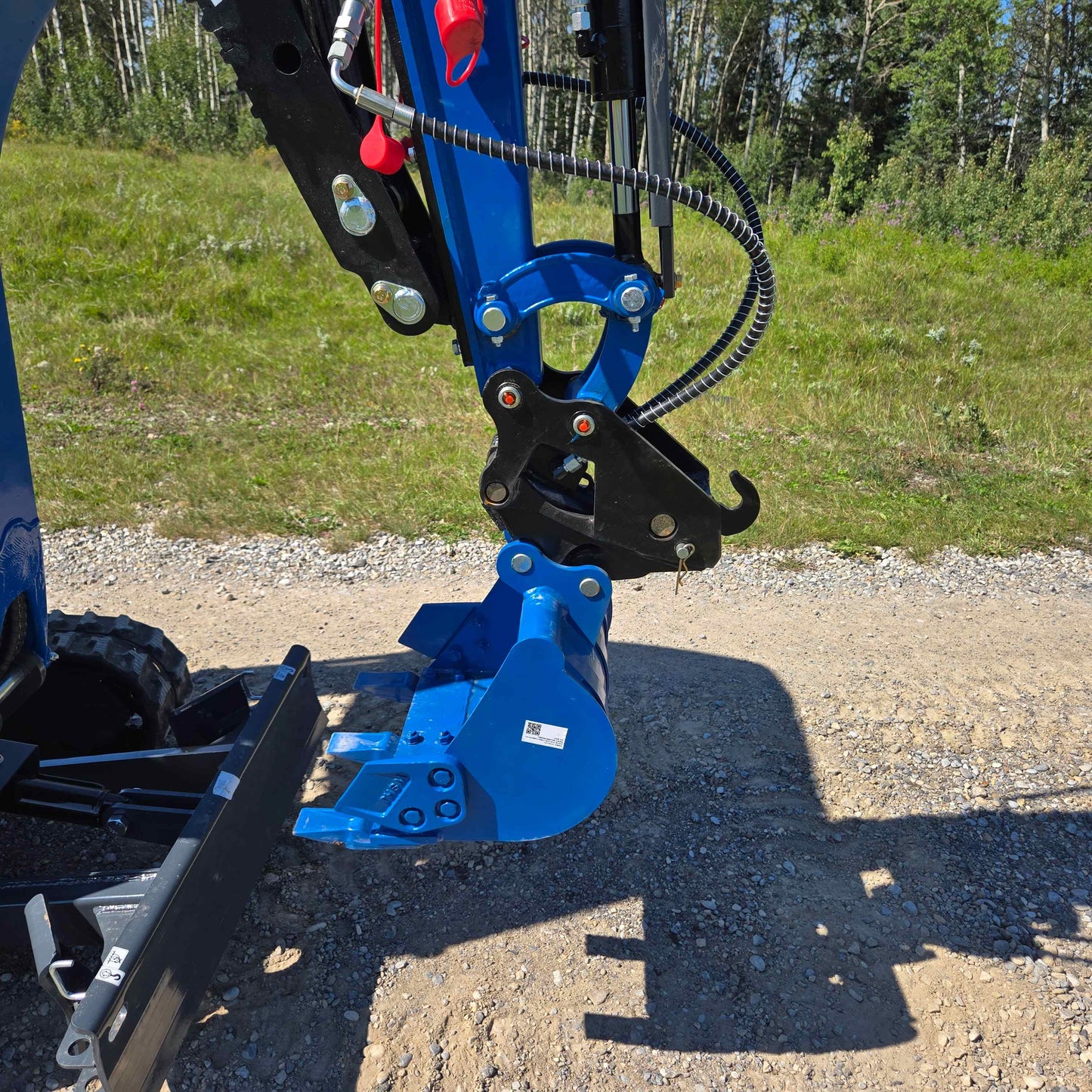 Bucket and hydraulic arm detail of Rippa R15 mini excavator Canada, compact 1.5 ton small digging machine with Kubota engine for landscaping and construction equipment projects

