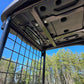 Protective ROPS cabin roof and safety guard design of the Rippa R15 Mini Excavator for operator protection.
