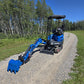 Rippa R15 mini excavator for sale with digging arm extended on gravel road in outdoor site
