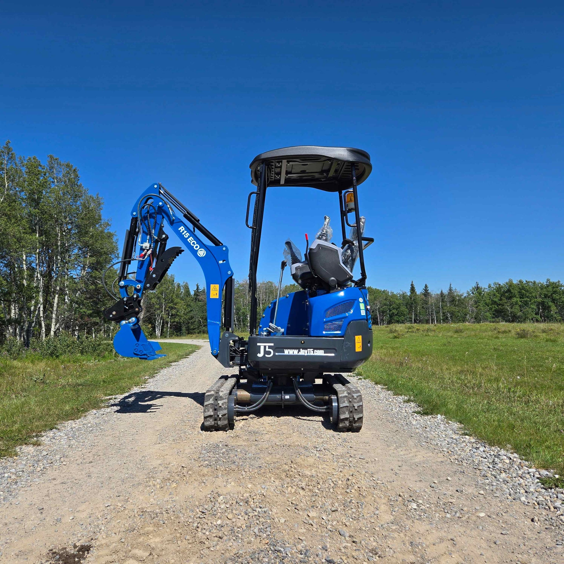Full rear view of Rippa R15 mini excavator Canada, compact 1.5 ton small Kubota engine powered excavator for digging and landscaping construction work

