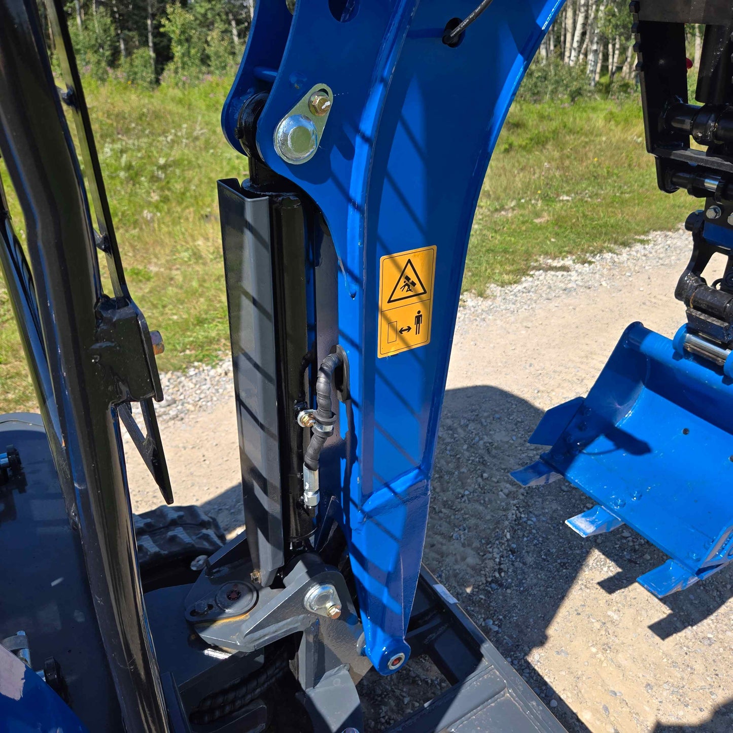Close-up hydraulic arm detail of Rippa R15 mini excavator Canada, JoyT5 J5 compact 1.5 ton Kubota engine powered small excavator for construction and landscaping projects