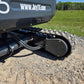 Rippa R15 Mini Excavator For Sale – close-up view of durable rubber track system for stable performance on rough terrain.
