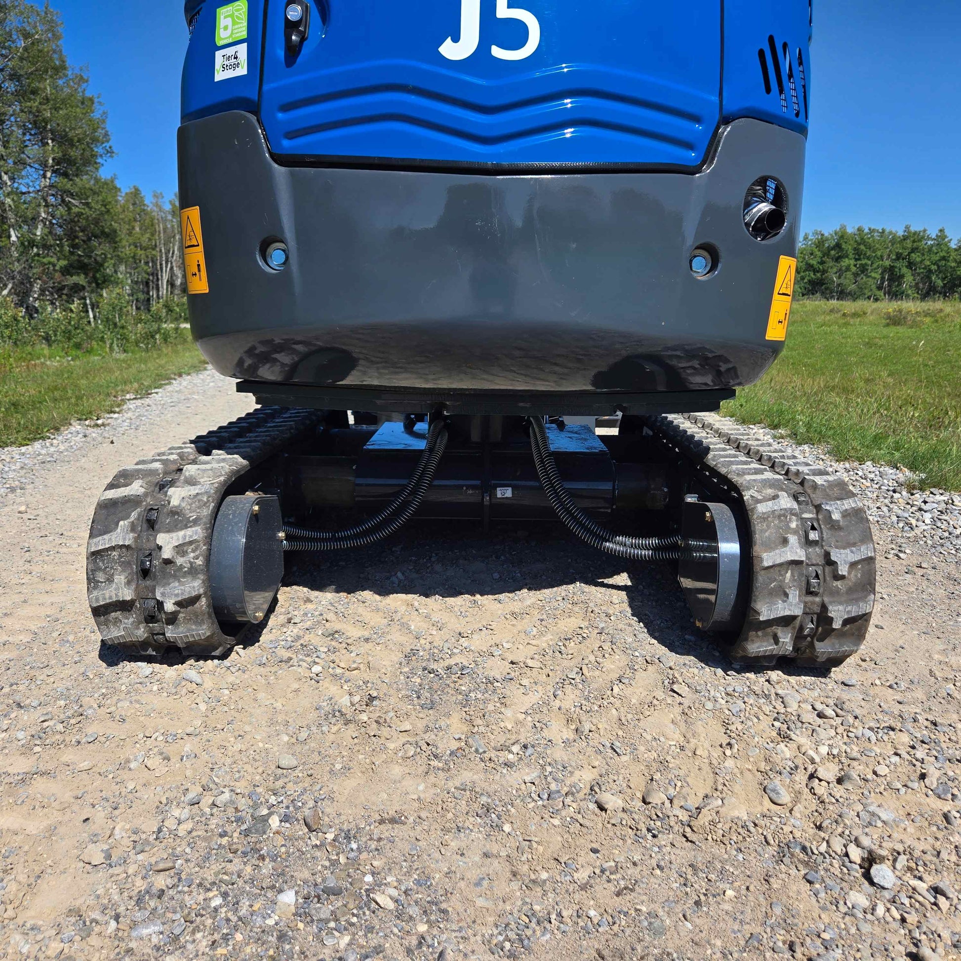 Undercarriage and track system view of Rippa R15 mini excavator Canada, compact 1.5 ton Kubota engine powered small digging machine for construction and landscaping projects