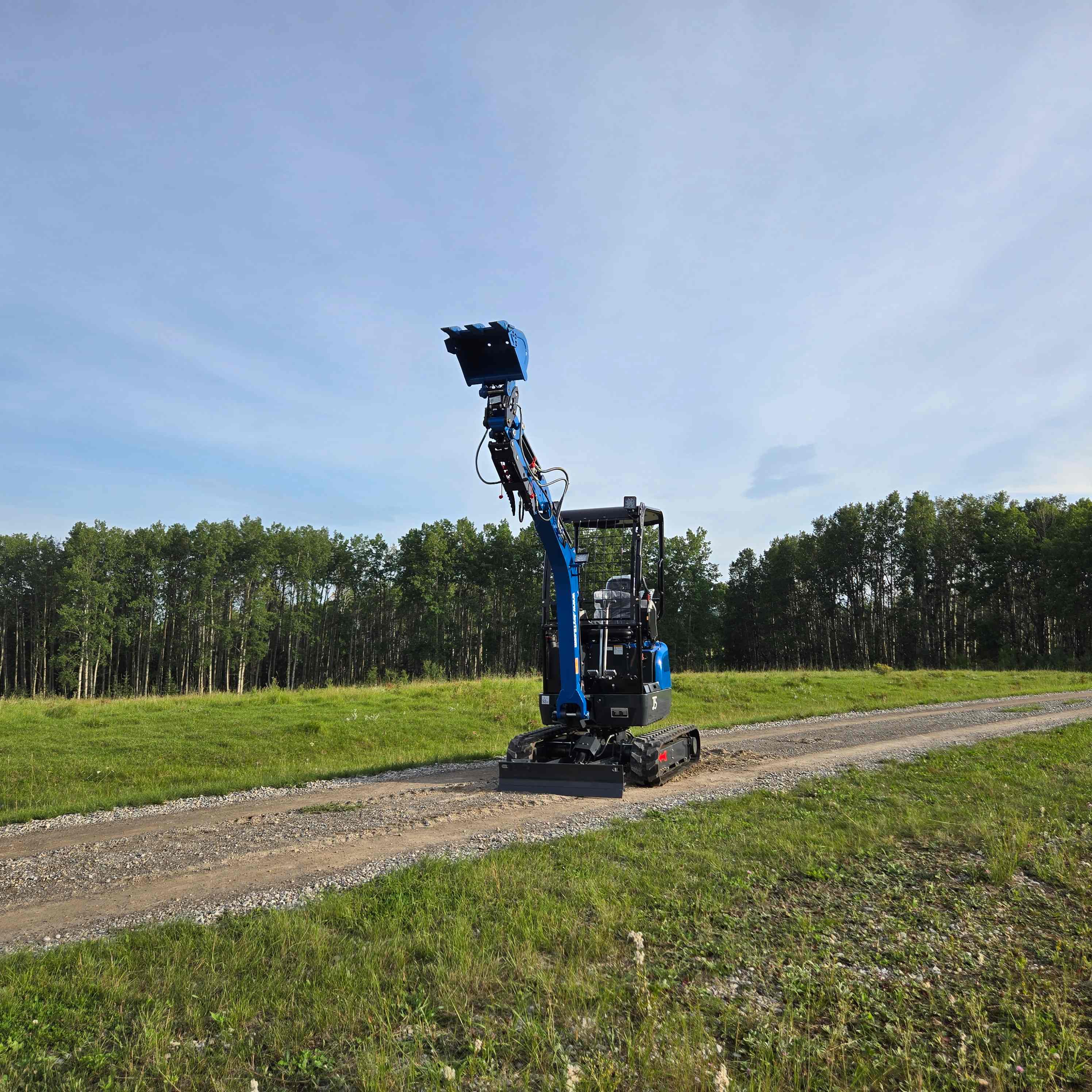 Rippa R18 1.8 Ton Mini Excavator for Sale in Canada working on a gravel road with raised boom JoyT5 compact excavator for construction in Canada