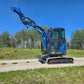 Rippa R22 2 ton mini excavator for sale in Canada from JoyT5 side view with the arm raised compact excavator for landscaping and small construction using Yanmar engine