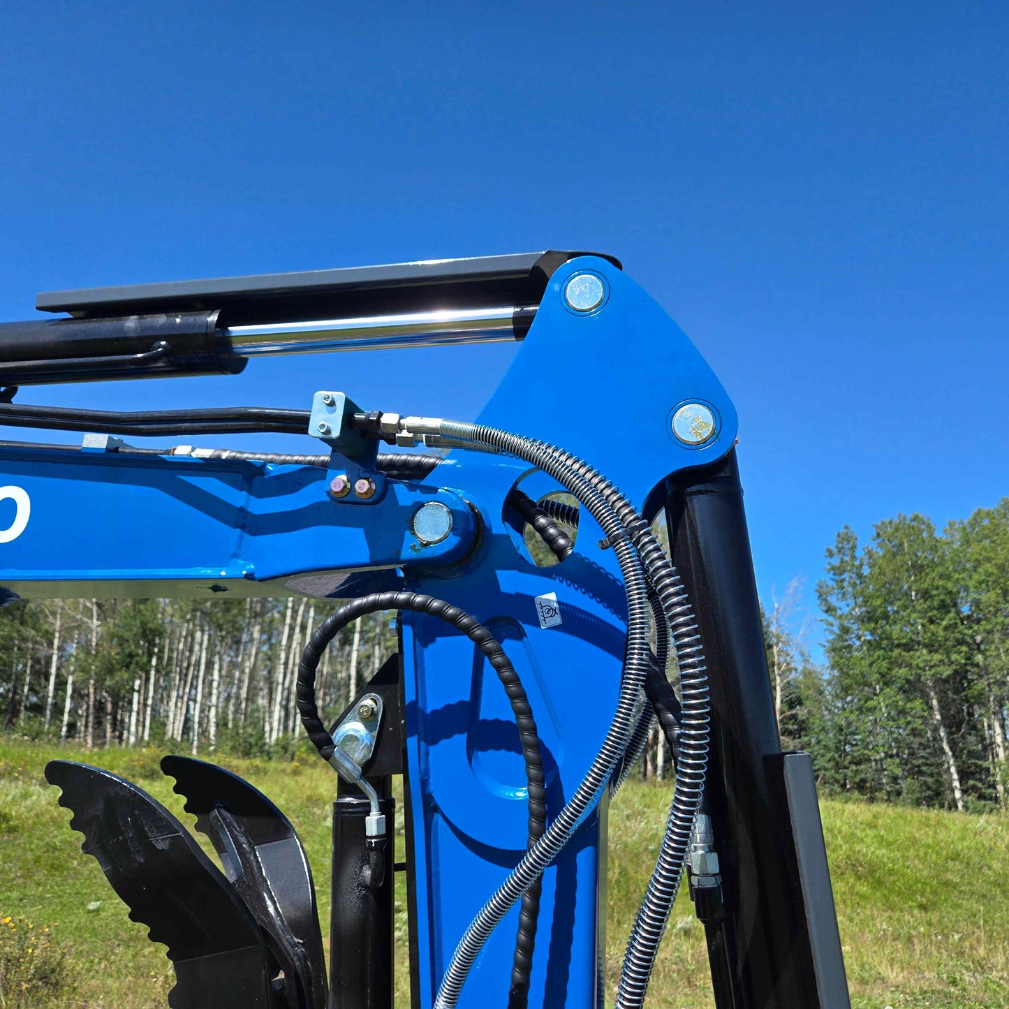 Top arm hydraulic joint of Rippa R22 mini excavator – compact 2 ton excavator for sale in Canada with Yanmar engine, showing durable hose connections and precision engineering design.

