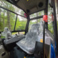 Cab interior of Rippa R32 Mini Excavator with operator seat, control levers, overhead fan, lighting, and fire extinguisher – JoyT5 Canada | JoyT5