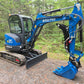 Rippa R32 Mini Excavator with trenching bucket shown in Canada forest, compact excavator for landscaping and construction | JoyT5