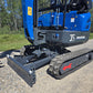 Rippa R15 Mini excavator for sale front blade and rubber track close-up view on gravel road