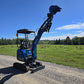 rippa r15 Mini excavator for sale R15 with raised boom and bucket working on gravel road in open field