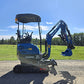 Compact rippa r15 mini excavator for sale side profile on gravel path with digging bucket