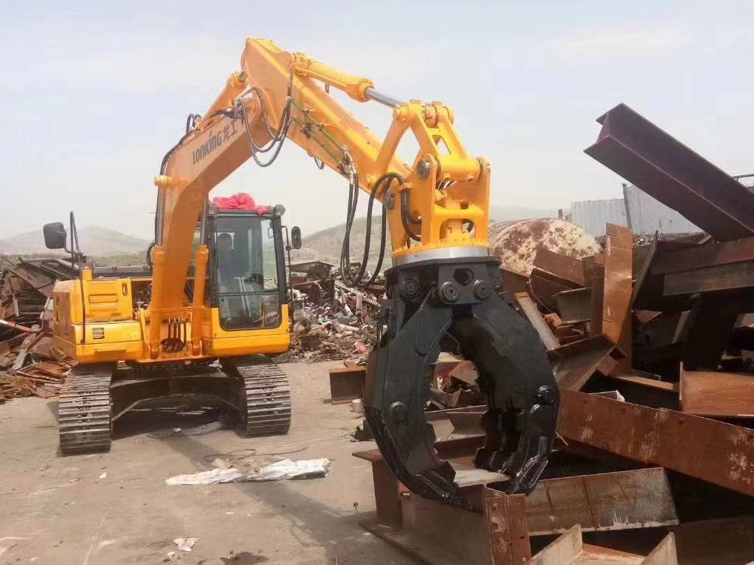Excavator using rotating grapple attachment to handle heavy steel and demolition debris for construction and recycling projects in Canada

