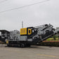 tracked mobile impact crusher in Canada showing portable crushing equipment used for mining recycling demolition and aggregate production


