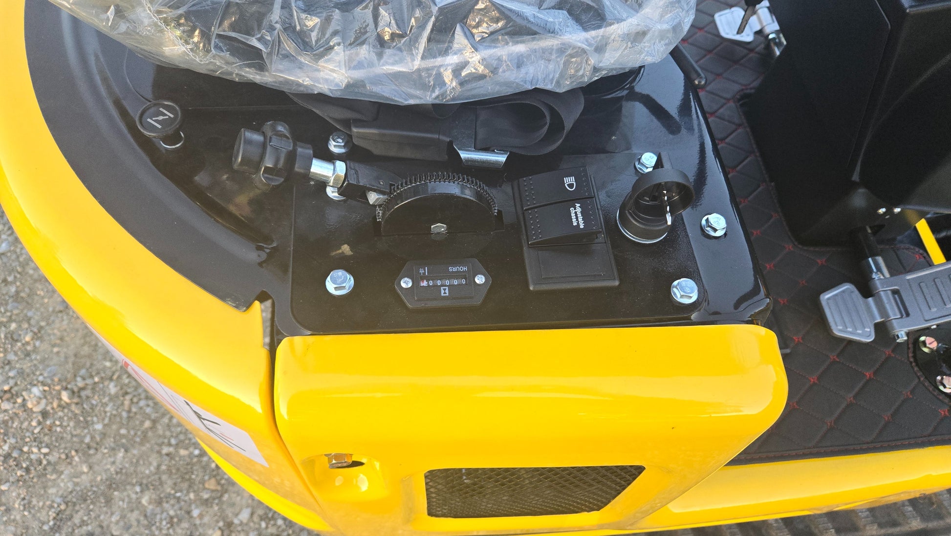 YardHoe YH12 1 ton mini excavator control panel showing ignition switches and operator controls in Canada with JoyT5 support for compact gasoline excavator buyers