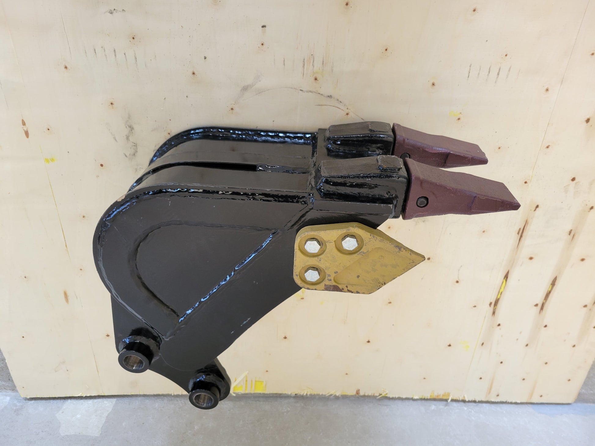 Heavy duty mini excavator trenching bucket side angle showing dual sharp teeth and strong steel design for digging and landscaping work in Canada

